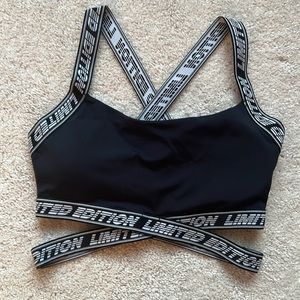 Forever 21 Sports bra in Black with cris cross straps Medium!